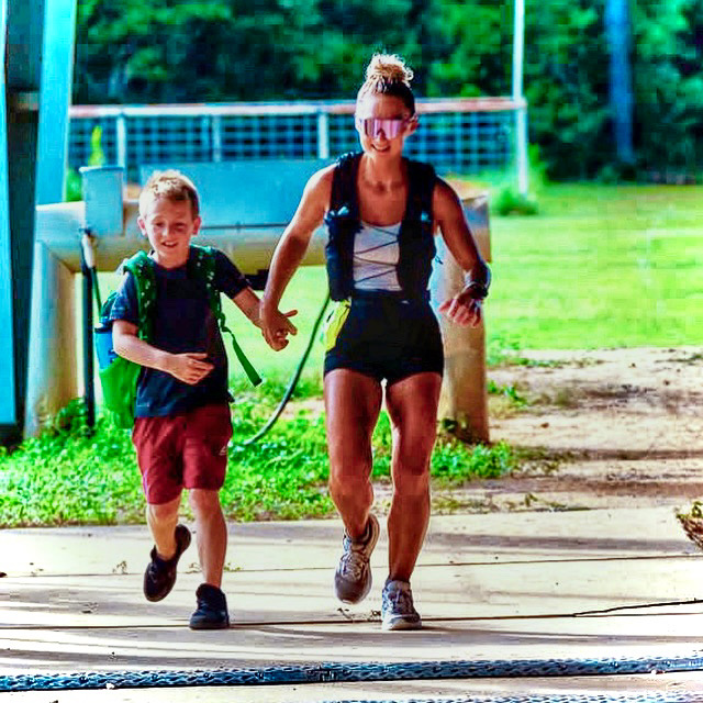 Running into the finish with my son